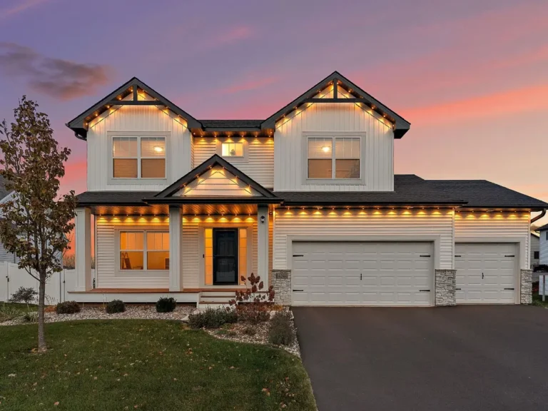 Twilight exterior of a luxury home in the Twin Cities, MN captured by UAV Vision Media — showing dramatic dusk lighting, upscale architecture and premium real-estate photography by Chris Blaeser