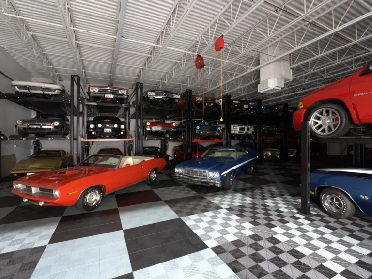 Warm, nostalgic view of a vintage car showroom floor in Minnesota, highlighting classic automotive details and craftsmanship—expertly photographed by Chris Blaeser of UAV Vision Media, a trusted local Native American photography company