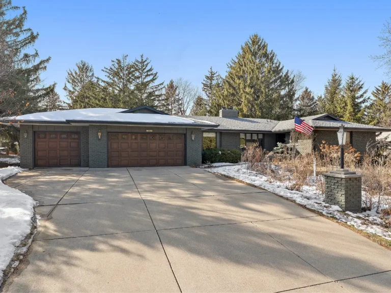 best-spring-to-summer-real-estate-photo-transformation-mn-residential-home-driveway-exterior-daylight-property-view-Chris-Blaeser-UAV-Vision-Media